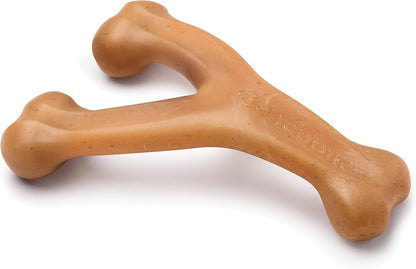 Dog chewing a Benebone Wishbone long-lasting nylon chew toy