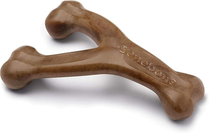 Dog chewing a Benebone Wishbone long-lasting nylon chew toy