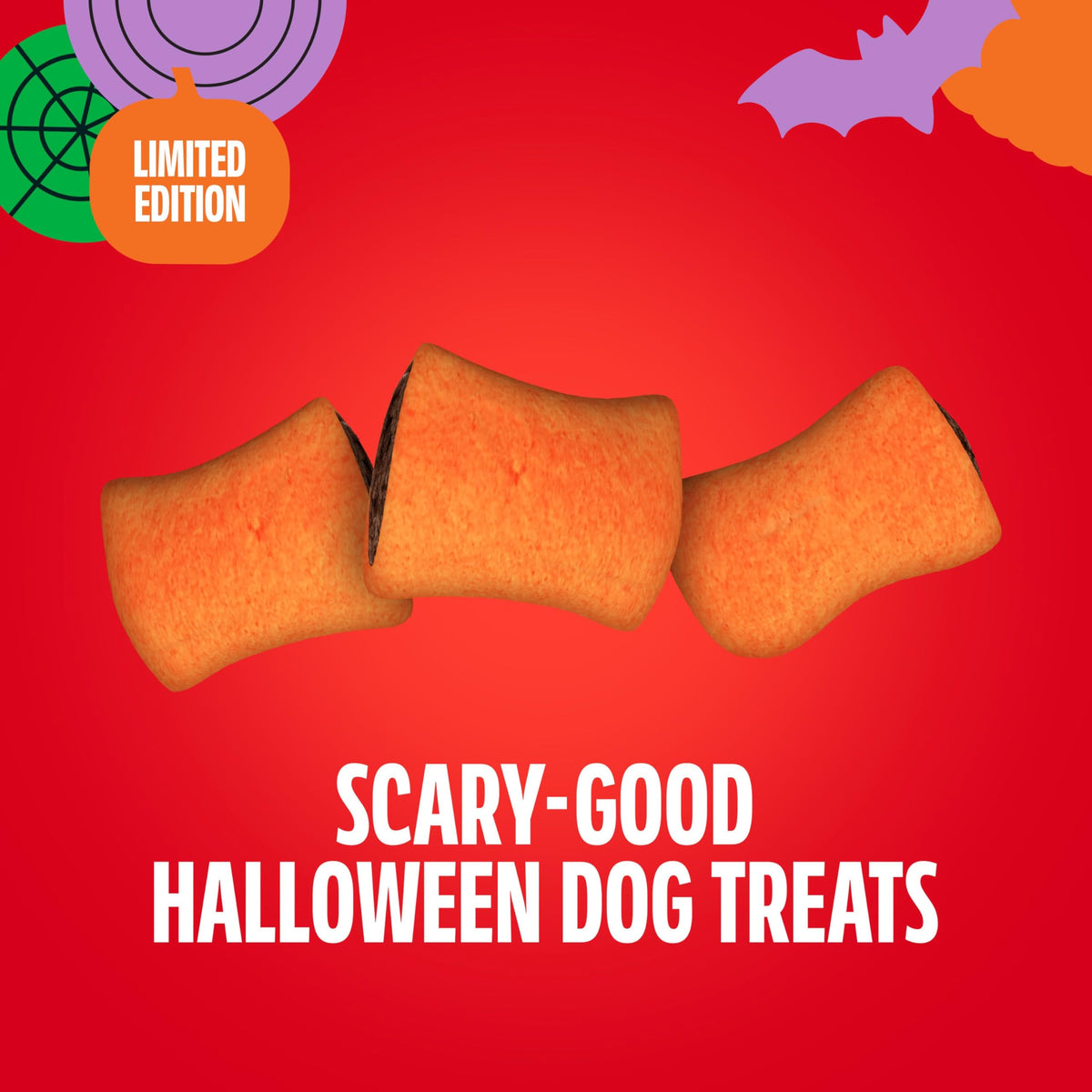 Dog eating a Milk-Bone MaroSnacks crunchy biscuit treat