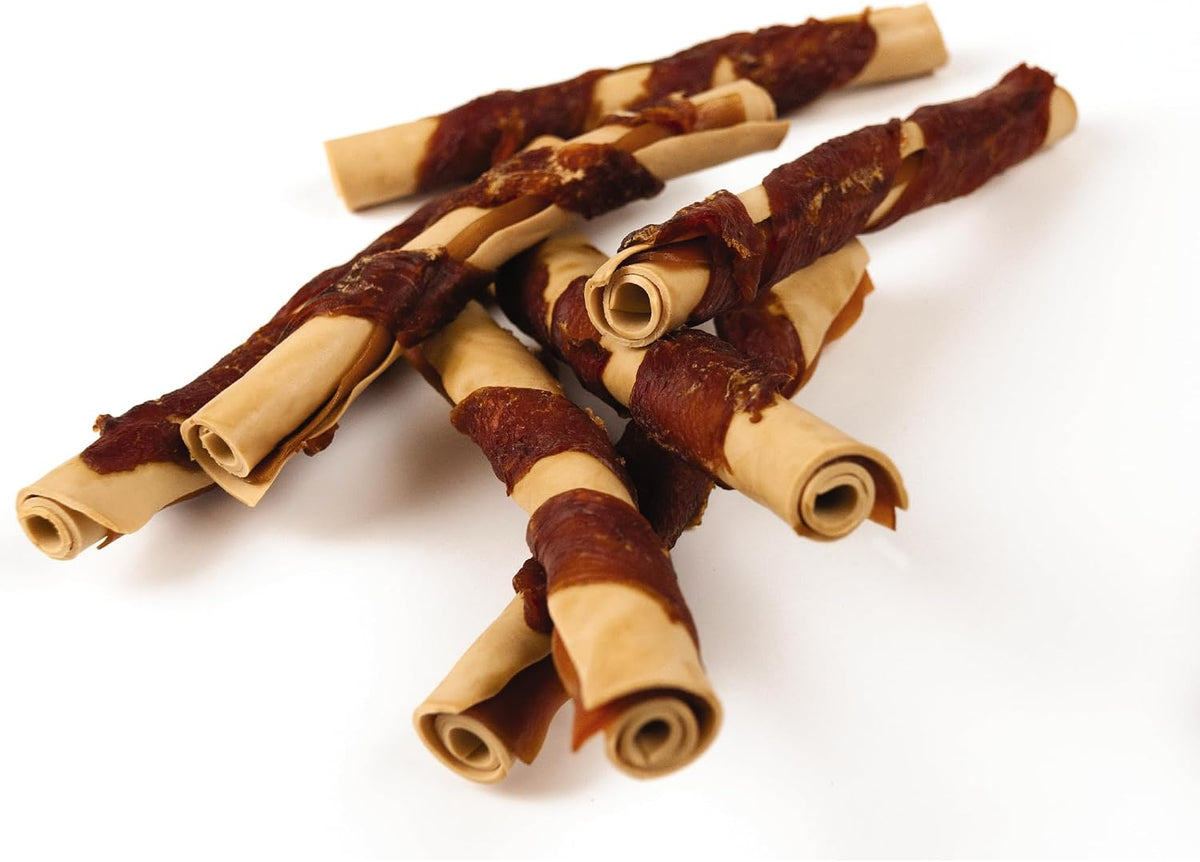 Dog chewing a SmartBones chicken wrapped stick