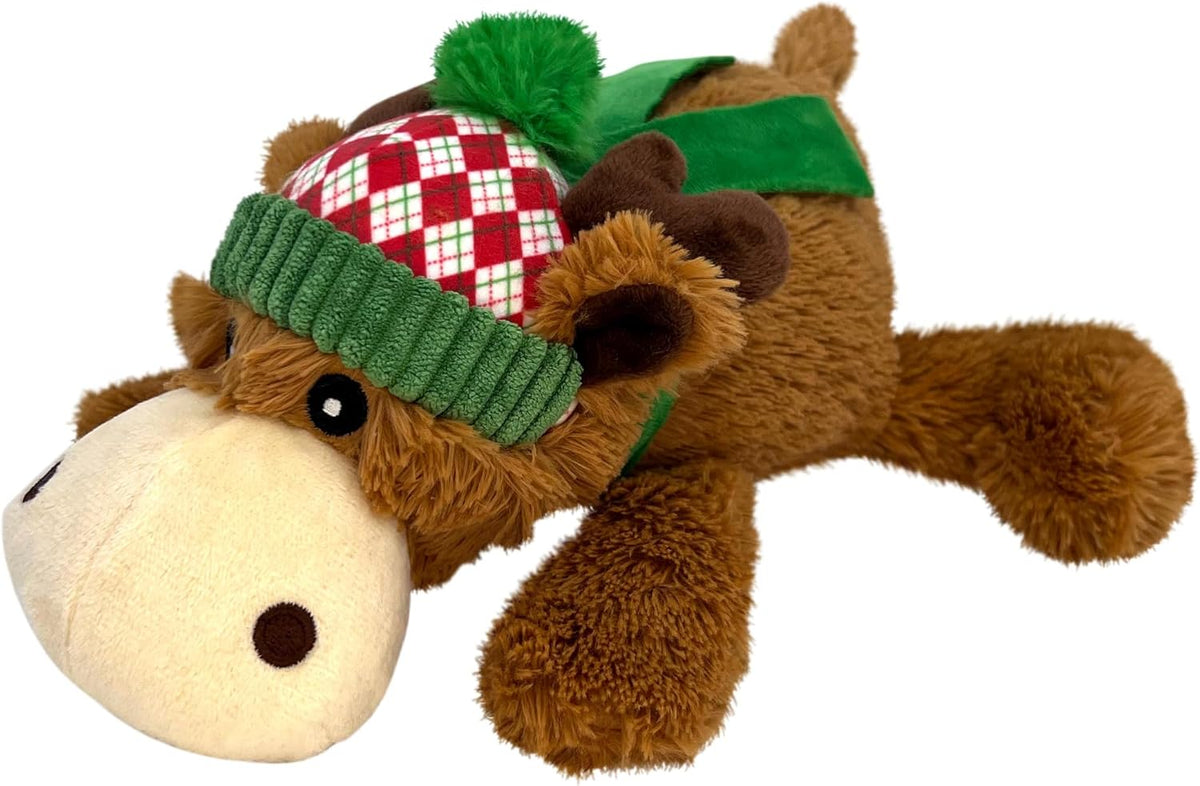 KONG Holiday Cozie Reindeer lying down – side view of the plush reindeer wearing a red plaid snowcap and green scarf