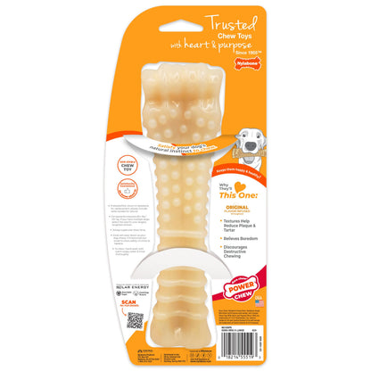 Dog chewing a Nylabone Power Chew nylon bone toy