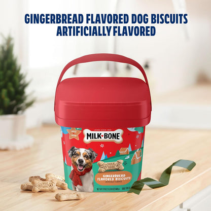 Milk-Bone Gingerbread Flavored Dog Biscuits tub on a kitchen table with biscuits
