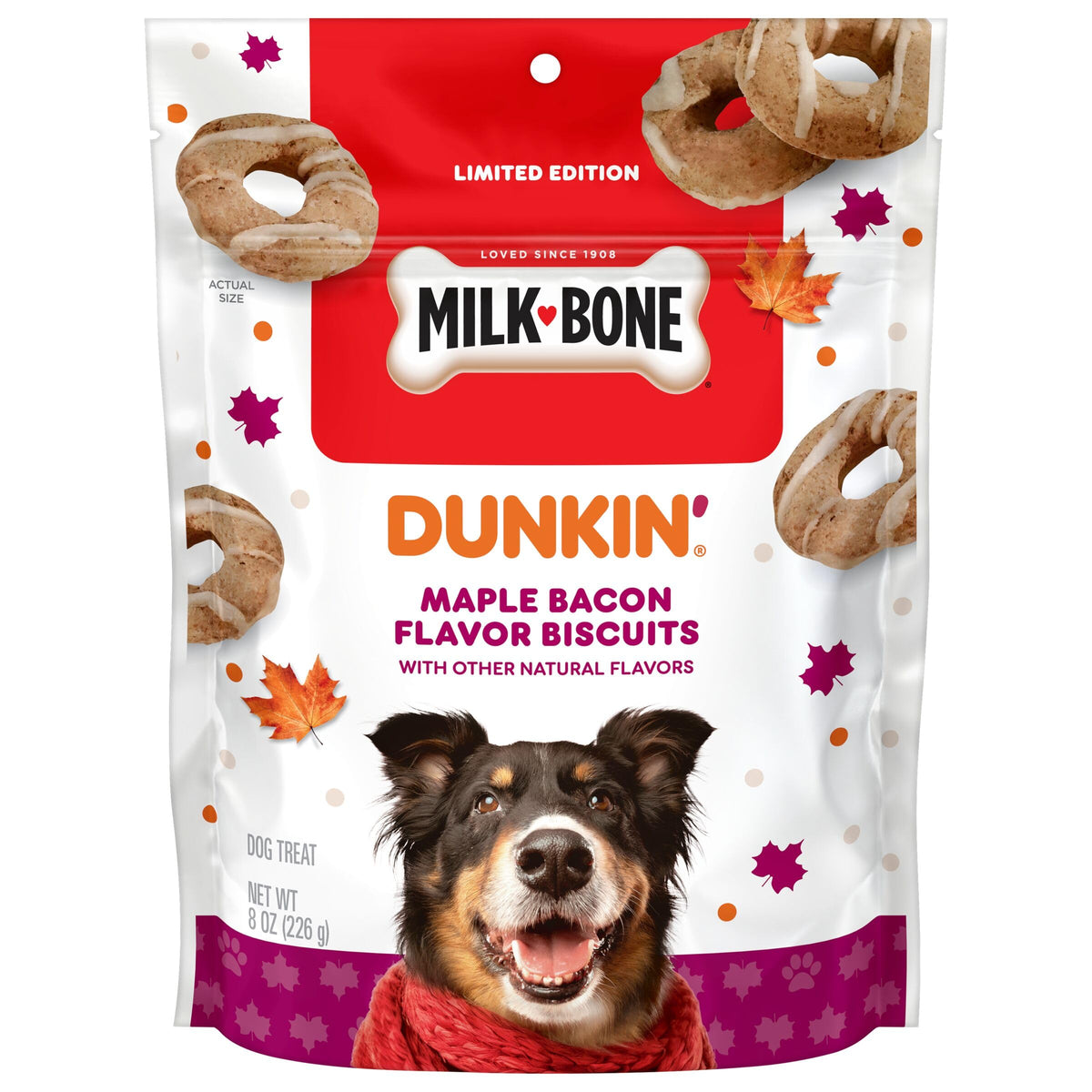 Dog eating a Milk-Bone MaroSnacks crunchy biscuit treat