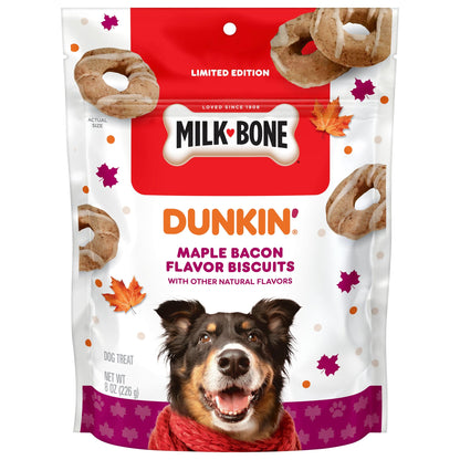 Dog eating a Milk-Bone MaroSnacks crunchy biscuit treat