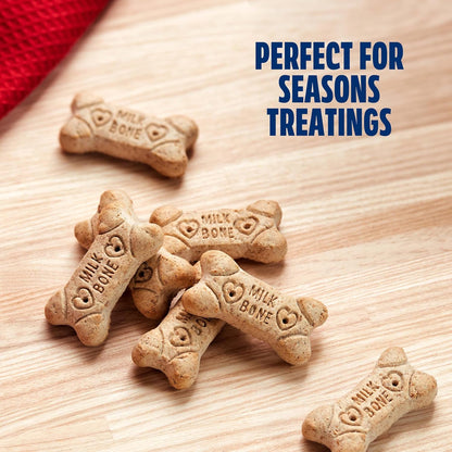 Milk-Bone biscuits on a wooden table with Perfect for Seasons Treatings text