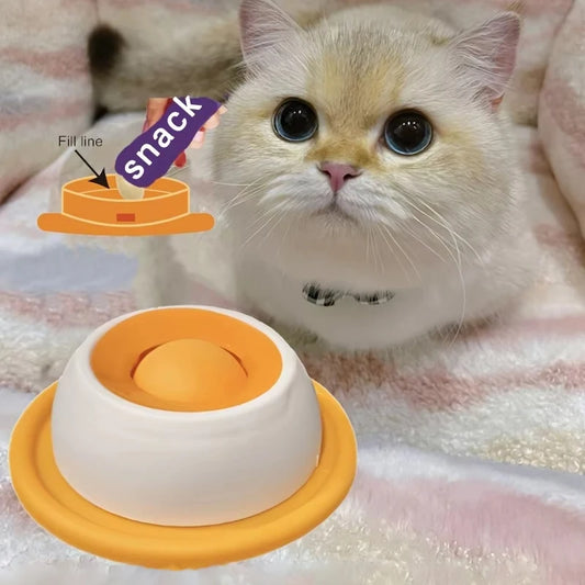 Cat with a white and orange cat toy on a soft surface